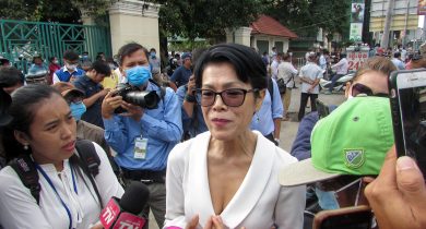 Theary Seng speaks to the media prior to the treason trial of more than 100 opposition figures, in Phnom Penh, Cambodia November 26, 2020.