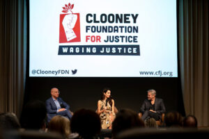 Amal and George Clooney speak to Ford Foundation President and CFJ Board Member Darren Walker at a lunch to launch The Albie Awards. Credit: Simon Luethi