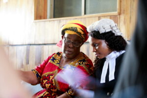 A lawyer and the a relative of a defendant at the Federal high court in Abuja. Source: Reuters