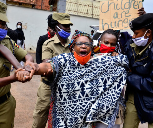 Ugandan activist and writer Stella Nyanzi getting detained by officers