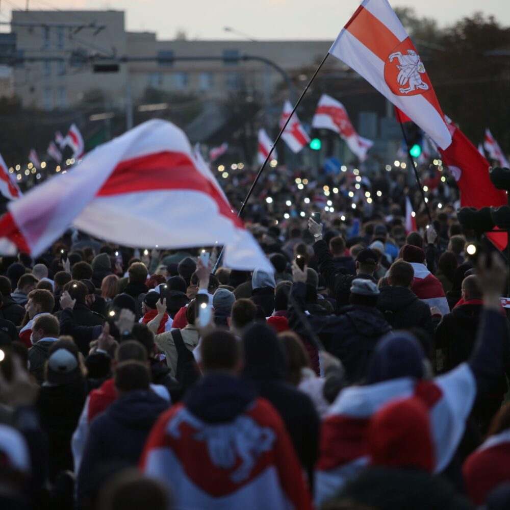People attend an opposition rally to reject the Belarusian presidential election results in Minsk, Belarus October 25, 2020.
