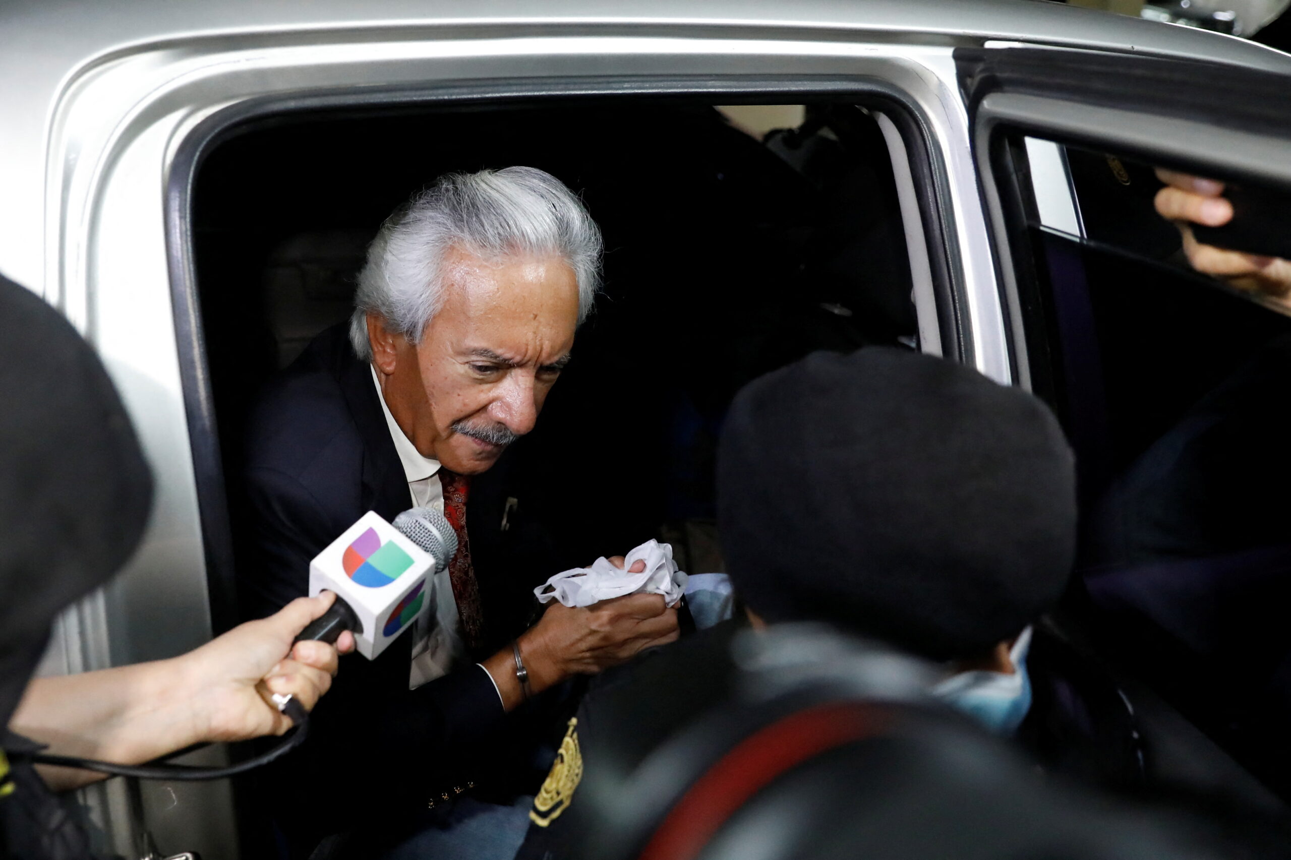 Journalist Jose Ruben Zamora Marroquin, founder and president of El Periodico newspaper, arrives at a court hearing at the towering judicial building days after his detention by Guatemalan authorities on money laundering and blackmail allegations