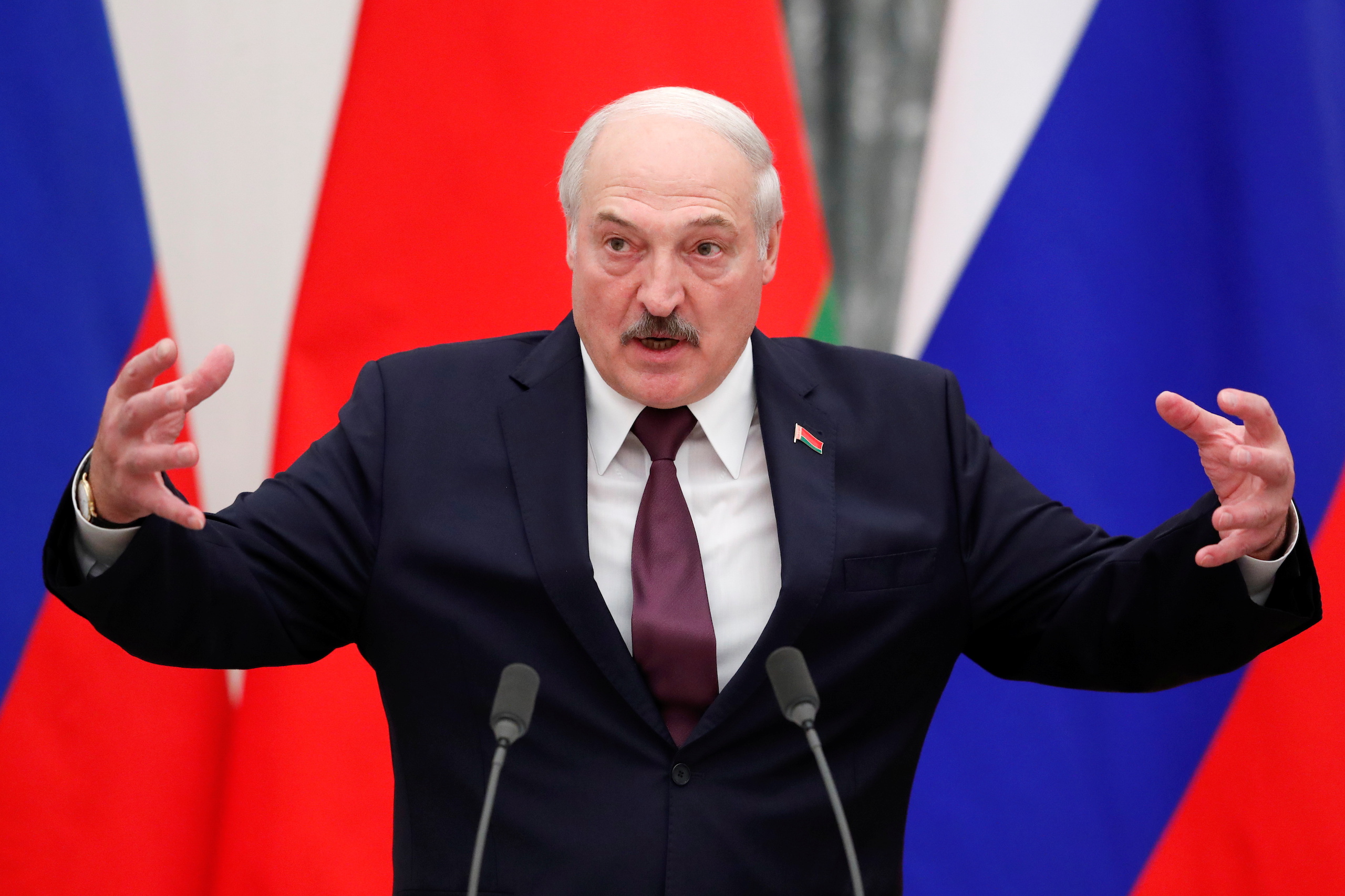 Belarusian President Alexander Lukashenko speaks during a news conference