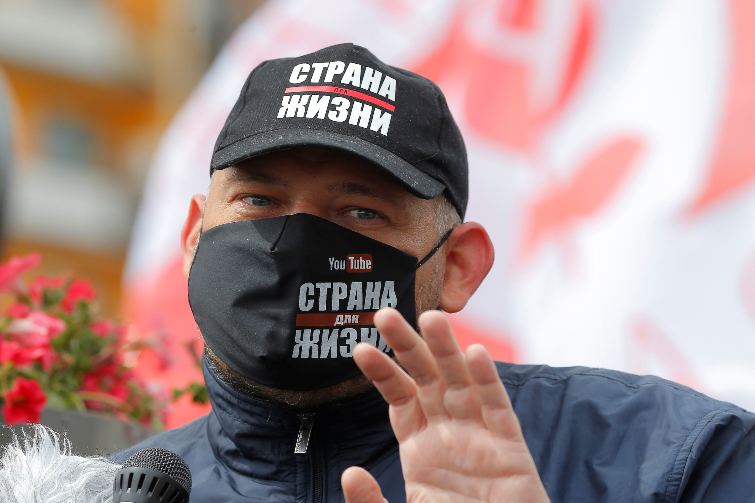 Blogger Sergei Tikhanovsky speaks during a rally of opposition supporters in Minsk