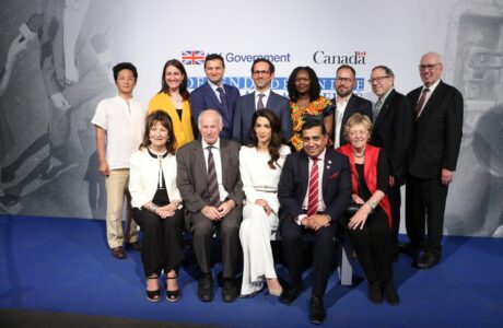 Participants in a panel on media freedom in a group photo with Amal Clooney