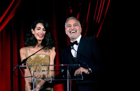 Amal Clooney and George Clooney speak onstage at the Clooney Foundation For Justice Inaugural Albies ceremony