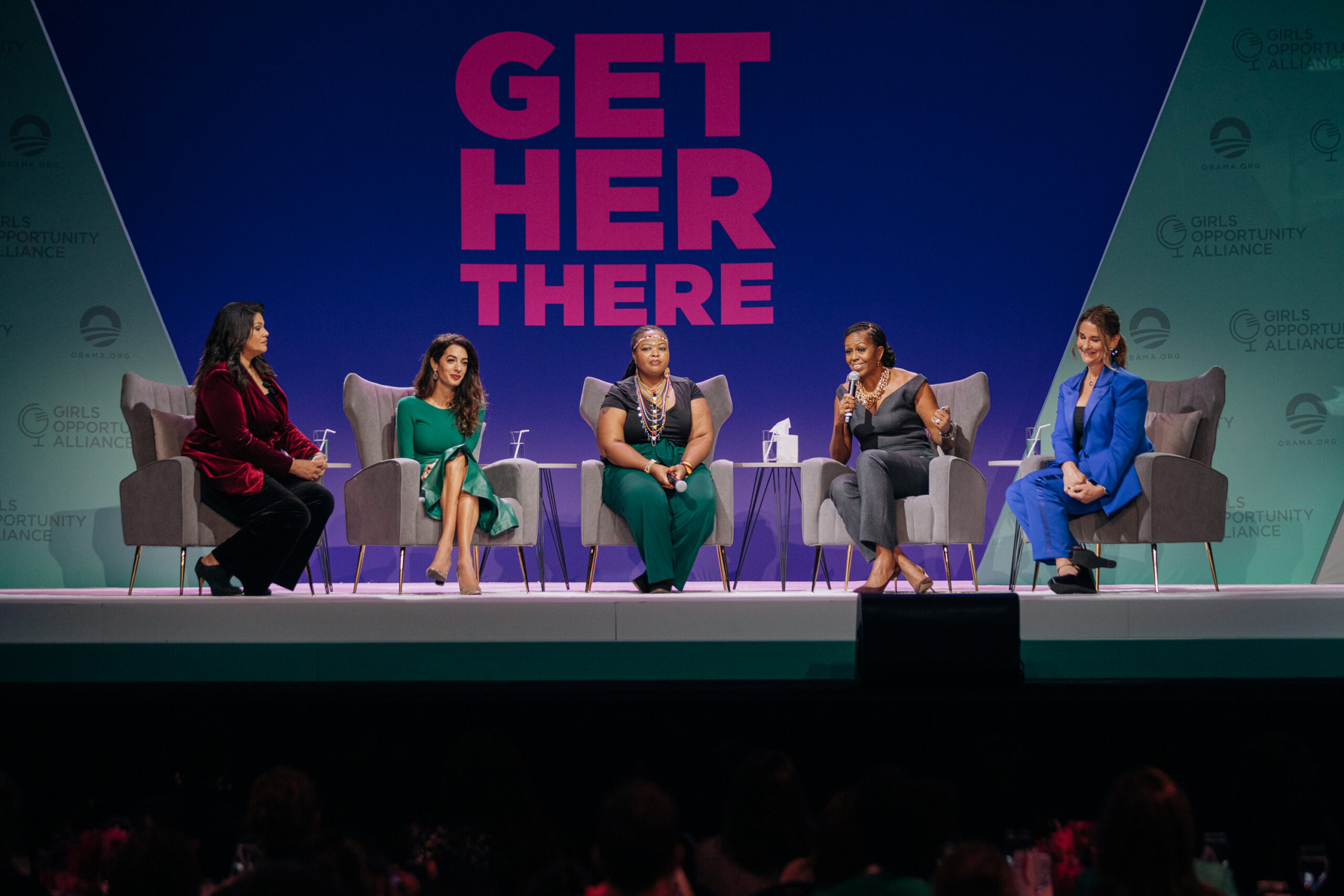 From left to right, Sara Sidner moderates a panel with Amal Clooney, Wanjiru Wahome, Michelle Obama, and Melinda French Gates