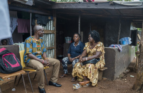 Paralegals providing legal advice to a woman in Freetown Sierra Leone