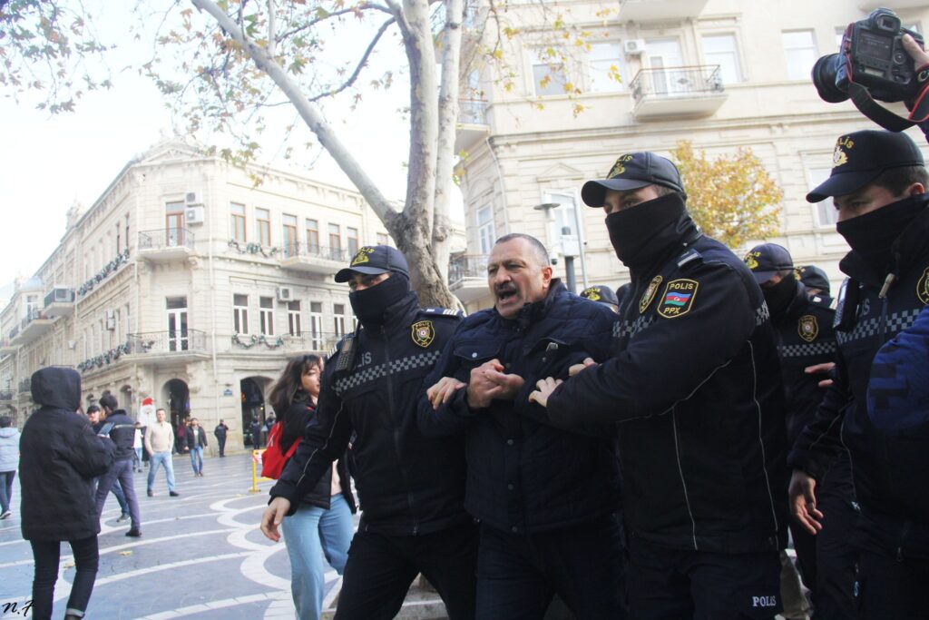 Tofig Yagublu being arrested during a protest