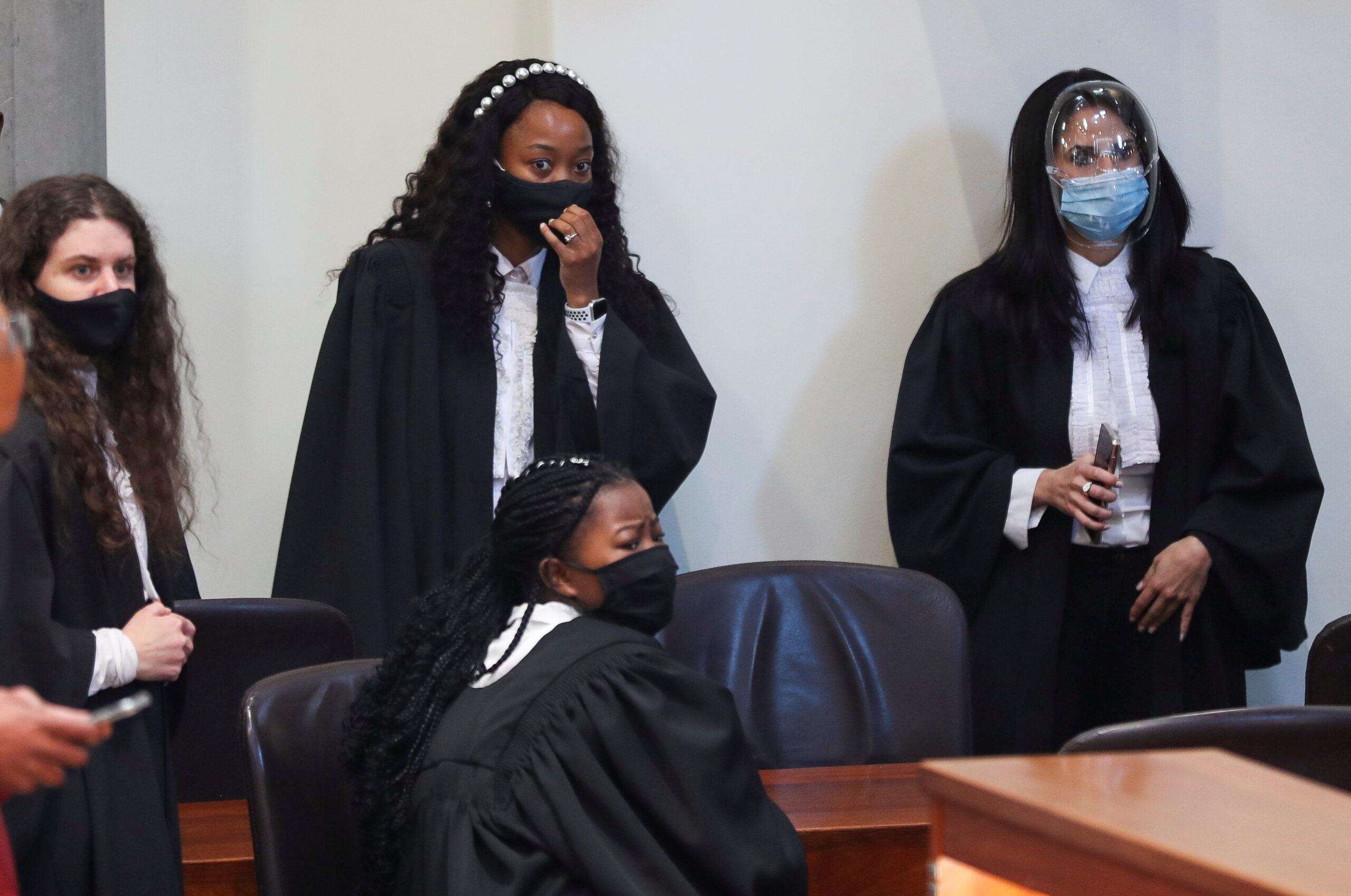 A group of women lawyers at court wearing COVID-19 masks