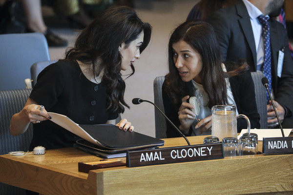 Amal Clooney talks to Nadia Murad at the UN