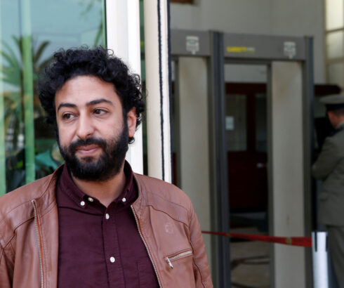 Journalist and activist Omar Radi waits outside court in Casablanca, Morocco on March 12, 2020.