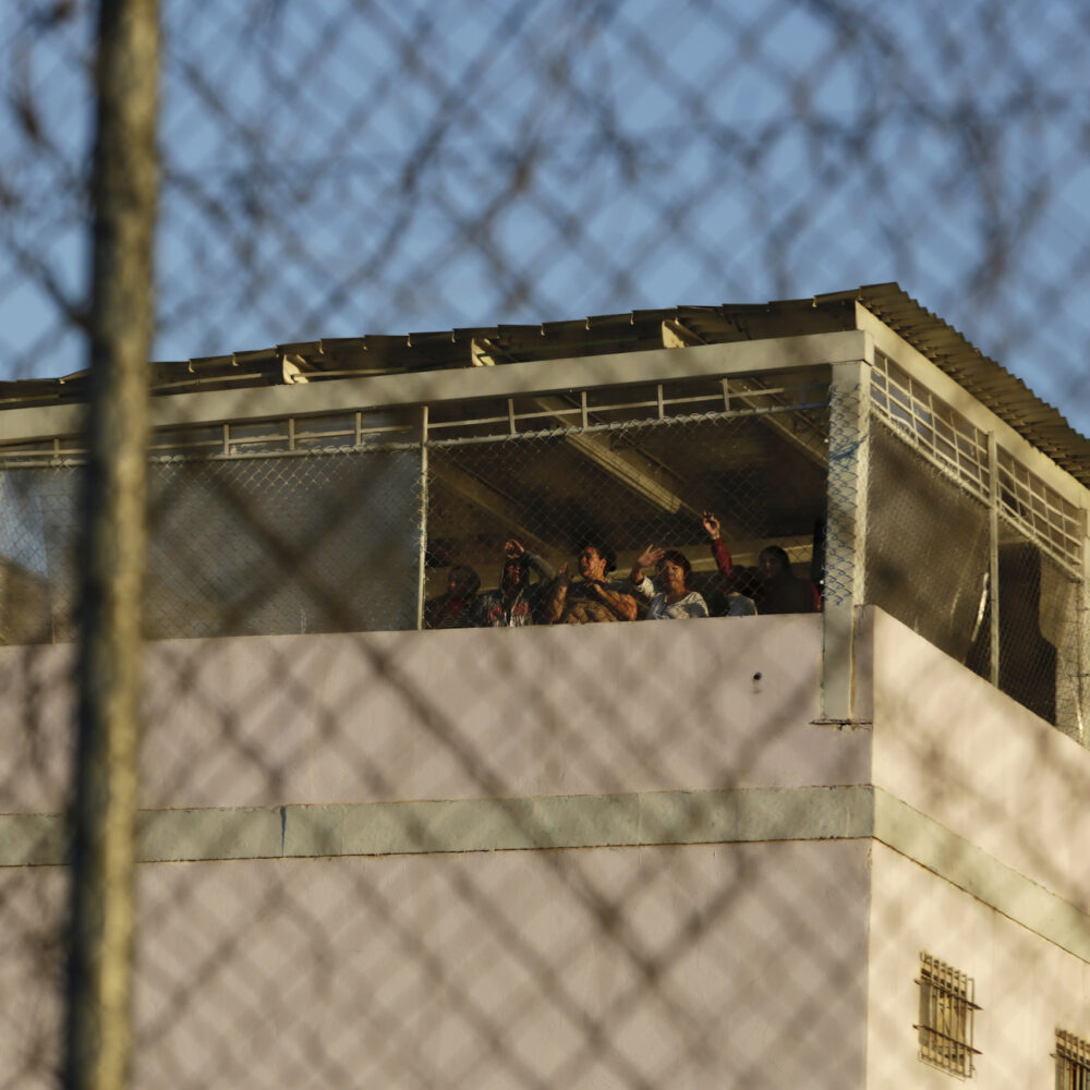 Female inmates look out of the Top Chico prison in Monterrey, Mexico