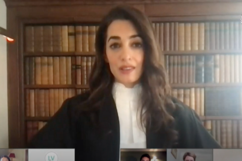 Amal Clooney attends a video conference.