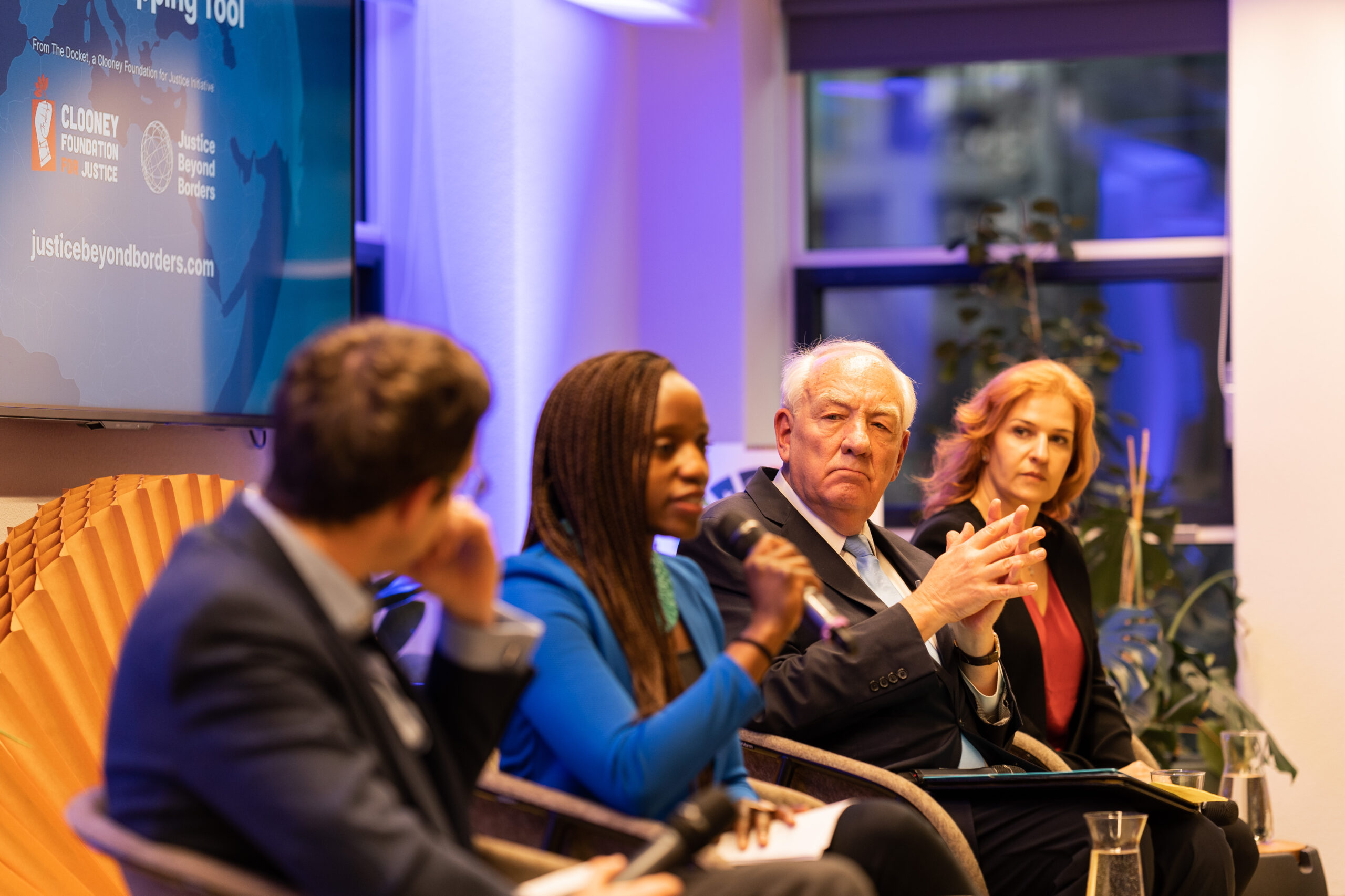The panel of experts speak at the launch of the Clooney Foundation for Justice's Justice Beyond Borders program