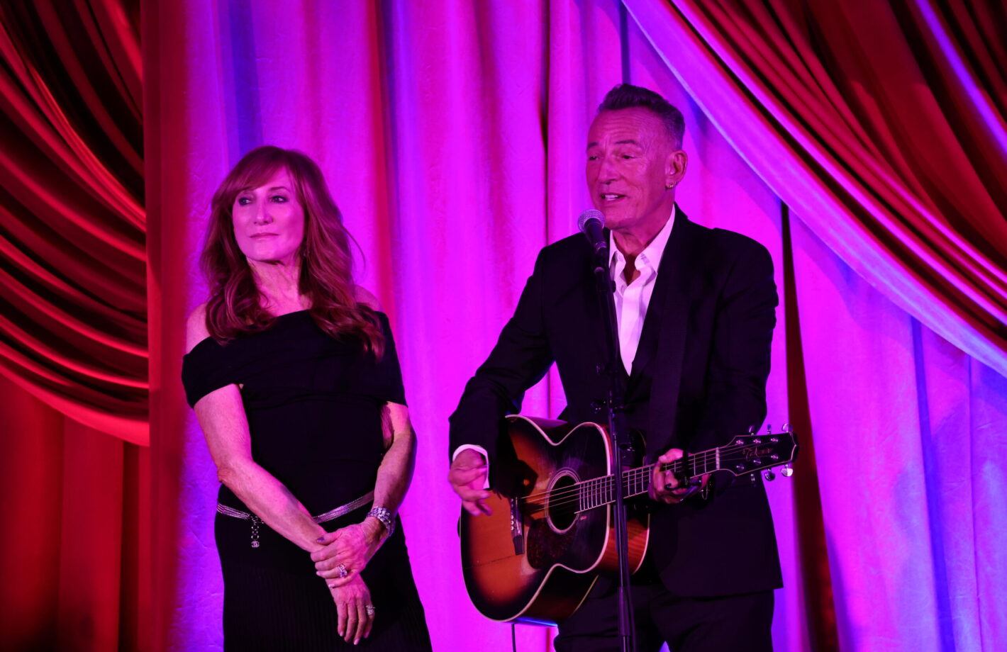 Patti Scialfa and Bruce Springsteen performing at the 2022 Albies
