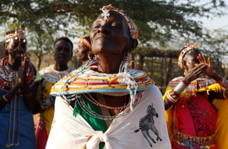 Kenyan FGM survivors participate in a traditional dance at a women-only village.